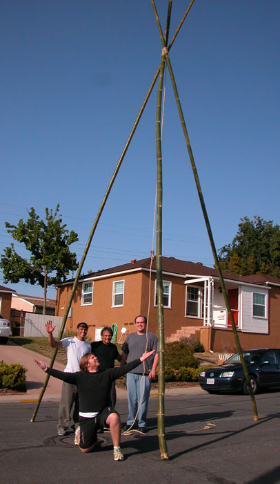 Geronimo and I test the bamboo tripod and lashings with the help of nighbors Eric and John.  It took all of us to erect the structure.  But it was stable and the rope and pulley system supportd the weight of each of us without a problem.  Peter Terezakis 2007 San Diego, California © Peter Terezakis 2007 http://www.terezakis.com